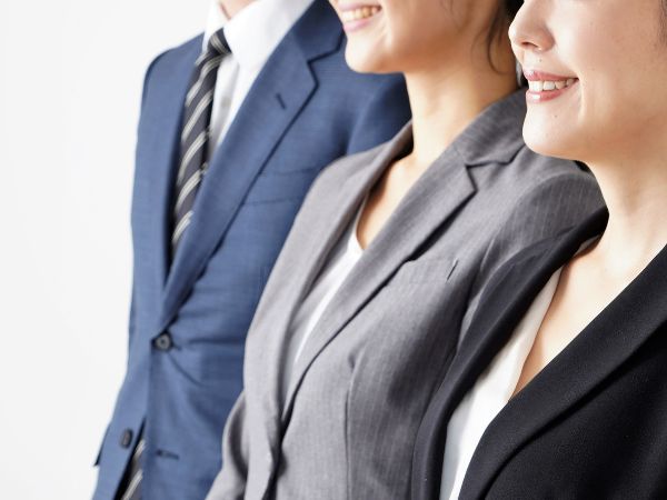 A group of instructors posing for a photo, looking ahead